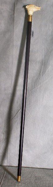 Chinese marine ivory figural walking stick with: Chinese marine ivory figural walking stick with a pig handle. L:36"