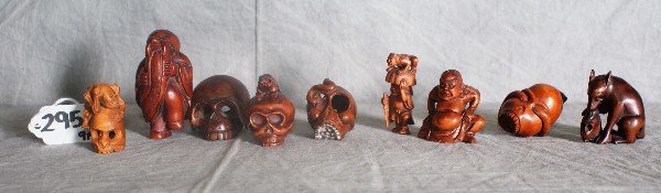 9 Chinese carved wooden netsukes.: 9 Chinese carved wooden netsukes. Signed