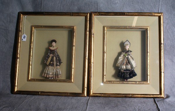 Pair of Chinese 19th C emperor and empress cerami: Pair of Chinese 19th C emperor and empress ceramic figures with silk clothing 1n shadow box frames with giltwood faux bamboo design. H:21" W:17. 5".