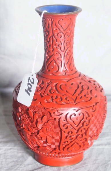 19th C Chinese cinnabar vase. H:8 5".: 19th C Chinese cinnabar vase. H:8 5".