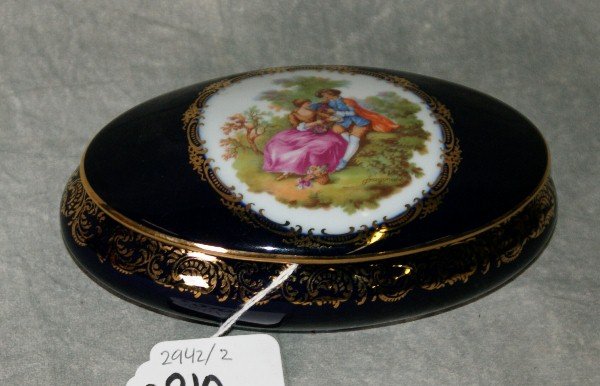 Limoges porcelain covered box. L:5.75" D:3.5": Limoges porcelain covered box. L:5.75" D:3.5"