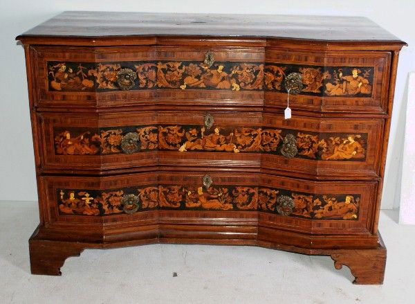 A museum quality 17th century Italian walnut ivory and: A museum quality 17th century Italian walnut ivory and ebony inlaid three-drawer commode. H:40" W:56.5" D:26"