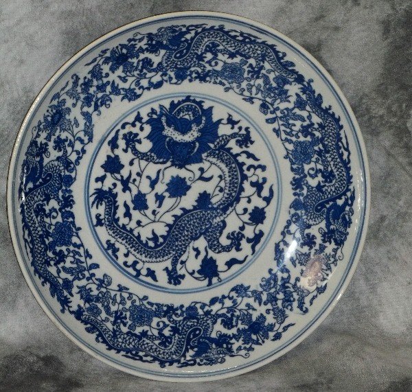19th c Chinese porcelain dragon plate: 19th c Chinese porcelain dragon plate with marks on back. D:9.75"