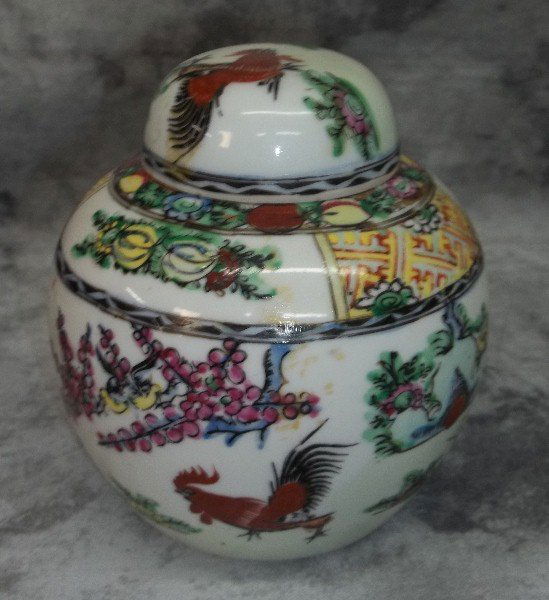 Chinese porcelain covered ginger jar: Chinese porcelain covered ginger jar with marks on bottom. H:4.5" D:4.25"