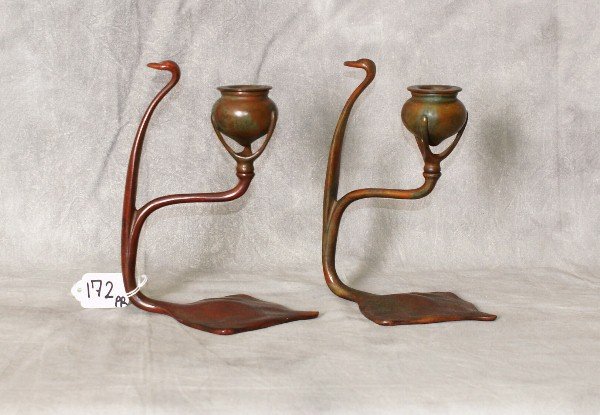 Pair of signed Tiffany bronze cobra style candlesticks: Pair of signed Tiffany bronze cobra style candlesticks signed Tiffany studios New York and numbered 1808. H:7.5"
