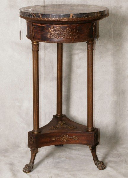 19th C mahogany bronze mounted marble top gueridon: 19th C mahogany bronze mounted marble top gueridon raised on bronze paw feet. H:27" D:15"