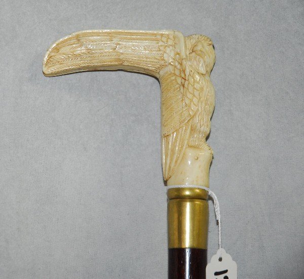 Marine ivory walking stick with owl form handle. L:36": Marine ivory walking stick with owl form handle. L:36"
