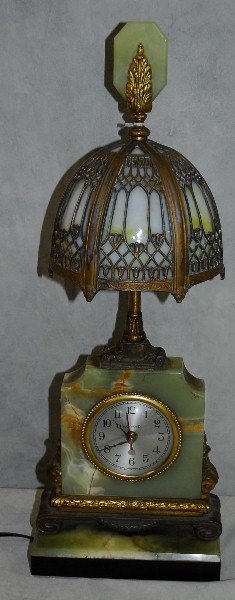 Antique onyx clock mounted as lamp with art glass shade: Antique onyx clock mounted as lamp with art glass shade. H:24" W:8"