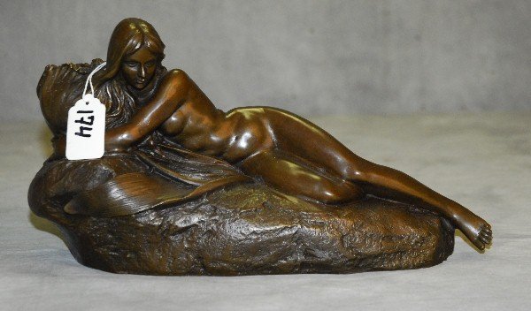 Bronze candle holder of nude woman on rock signed Milo.: Bronze candle holder of nude woman on rock signed Milo. H:6. 5" W:12"