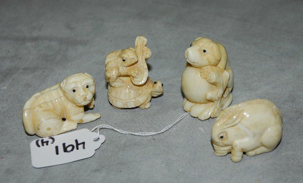 4 Marine ivory netsukes of animals. H:2": 4 Marine ivory netsukes of animals. H:2"