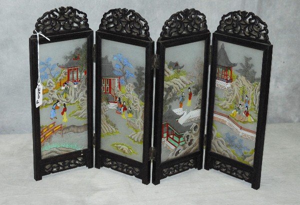 Chinese antique reverse painted glass table screen: Chinese antique reverse painted glass table screen in carved hardwood frame. H:13" overall W:20"