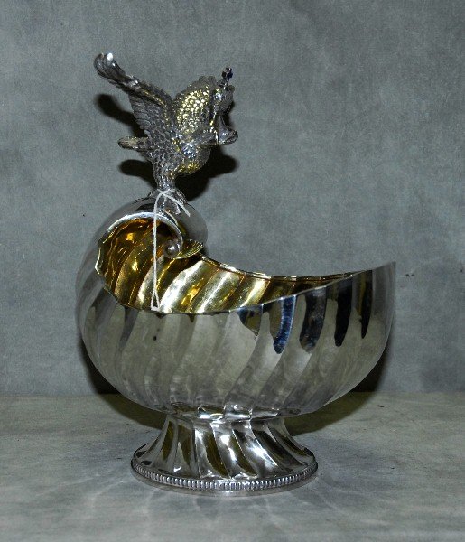 Imperial Russian Faberge silver Kvosh bowl with gold: Imperial Russian Faberge silver double eagle head with enamel cross Kvosh bowl with gold washed interior and having the Faberge and 88 silver mark on bottom. H:11" L:8.5" and weighs 44.75 T Oz . This