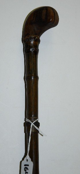 Knotted wood walking stick with inside dagger. L:35.5": Knotted wood walking stick with inside dagger. L:35.5"