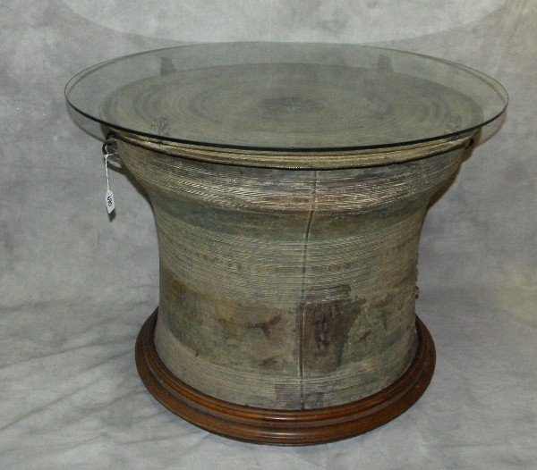 Antique Thai bronze glass top rain drum table on: Antique Thai bronze glass top rain drum table on teakwood base . H:24" D:32.5"