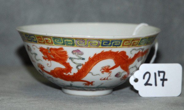 Chinese antique famille rose porcelain dragon bowl with: Chinese antique famille rose porcelain dragon bowl with 6 character mark on bottom. H:2" D:4.75"