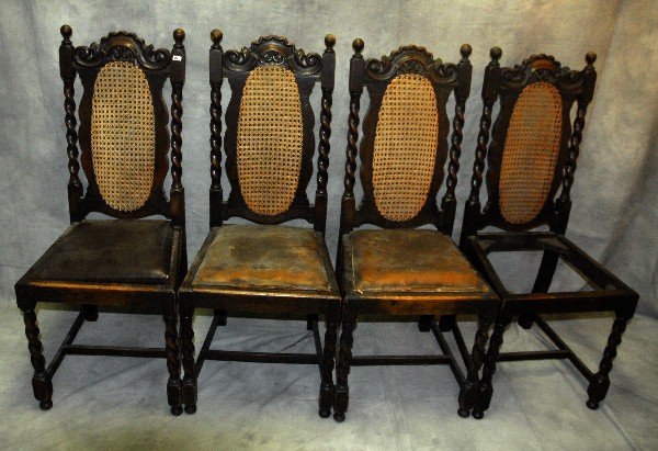 4 Jacobean style carved oak cane back chairs . H:42": 4 Jacobean style carved oak cane back chairs . H:42" W:17.75" D:17.5"