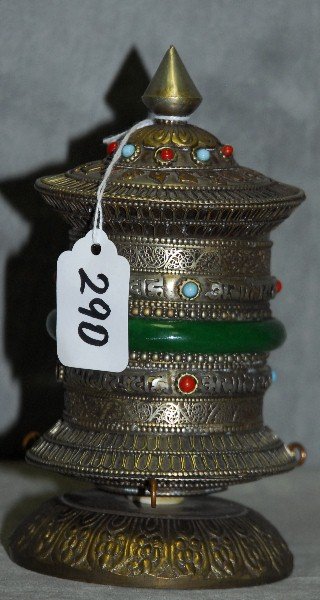 Mixed metal and jeweled prayer wheel with jade and: Mixed metal and jeweled prayer wheel with jade and other applied stones. H:6.5"