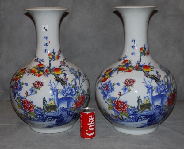 Lg Pair Chinese porcelain vases with deer and fruit: Lg Pair Chinese porcelain vases with deer and fruit , they have calligraphy on back and red seal mark. H:22"