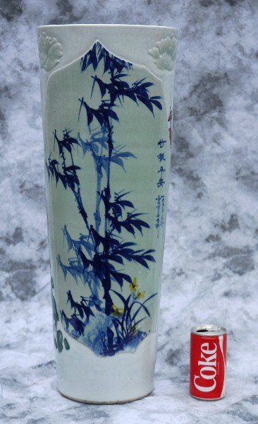 Chinese export porcelain umbrella stand: Chinese export blue and white and celedon porcelain decorated with bamboo and calligraphy. H: 25.5"