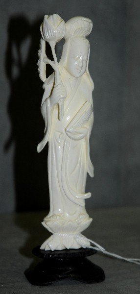 Chinese ivory quan yin figure on wood base. H:6.75": Chinese ivory quan yin figure on wood base. H:6.75"