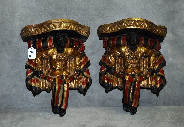 Pair venetian painted blackamoor wall brackets. H:12.5": Pair venetian painted blackamoor wall brackets. H:12.5" W:10.5" D:6"