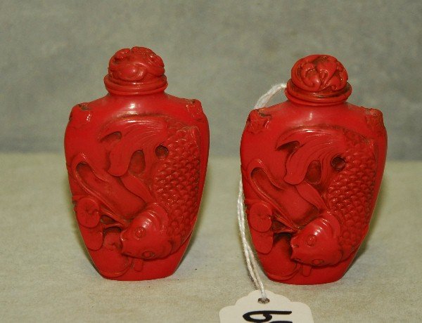 Pair Chinese coral color fish design snuff bottles with: Pair Chinese coral color fish design snuff bottles with caligraphy on back. H:3"