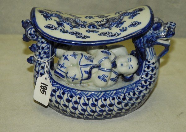 Chinese porcelain figural pillow with 6 character marks: Chinese porcelain figural pillow with 6 character marks on bottom. H:6.25" W:8.5" D:4"