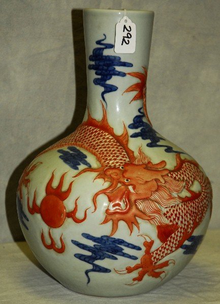 Chinese porcelain dragon vase with blue seal on bottom.: Chinese porcelain dragon vase with blue seal on bottom. H:14"