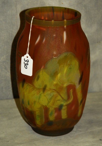 Signed Daum Nanct cameo art glass vase with elephant: Signed Daum Nanct cameo art glass vase with elephant design in relief. H:10"