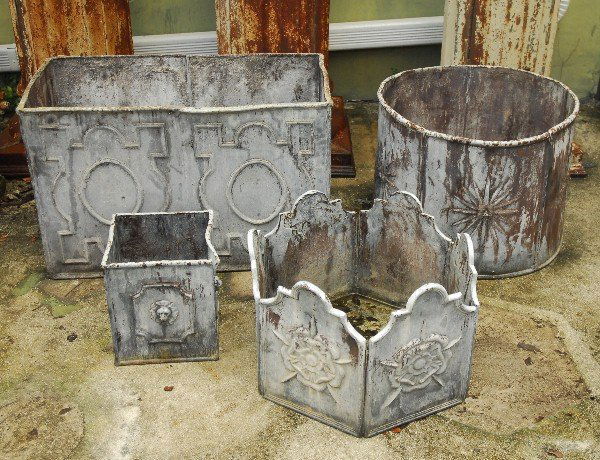 Four assorted size lead planters. Largest H:18" D:24" (1 of 1)