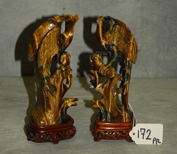 Pair Chinese tiger eye figures of birds on hardwood (1 of 4)