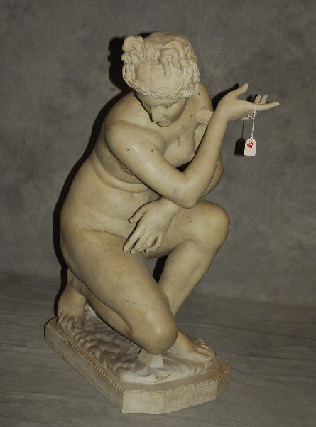 19th C marble statue of crouching Venus. H:35" W:13": 19th C marble statue of crouching Venus. H:35" W:13" D:21".