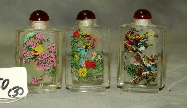 Three Chinese reverse glass painted snuff bottles.H:3" (1 of 2)