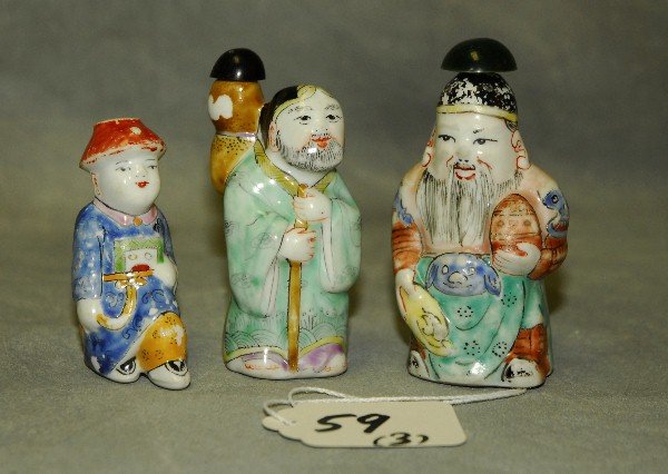 Three Chinese antique figural porcelain snuff bottles. (1 of 1)