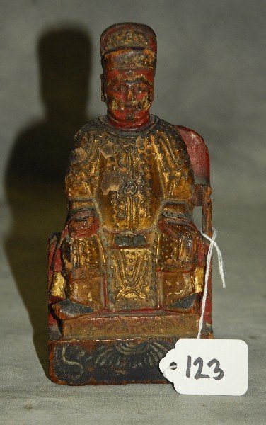 Antique Chinese carved and polychrome wood figure. H:7": Antique Chinese carved and polychrome wood figure. H:7" W:3.25"