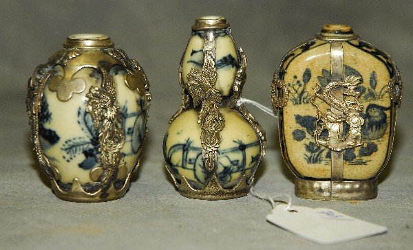3 Chinese silver mounted porcelain snuff bottles. (1 of 1)