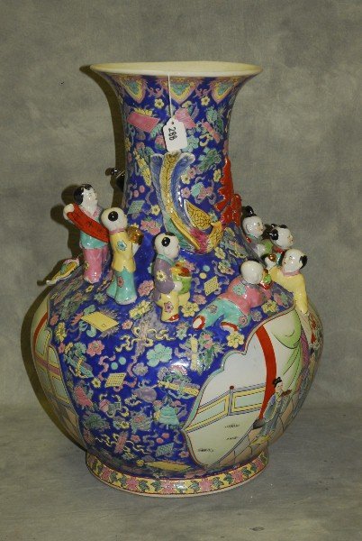 Large Chinese porcelain vase with applied figures. (1 of 1)