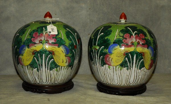 Pair of antique Chinese porcelain ginger jars on: Pair of antique Chinese porcelain ginger jars on hardwood stands 9 5" x 8"