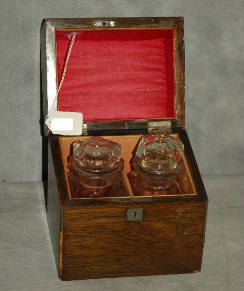 Brass bound rosewood tantalus set. H:6.75" W:6.5" (1 of 2)