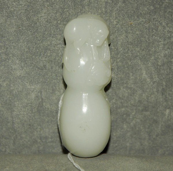 Chinese white jade carved pebble of monkey and snail on (1 of 3)