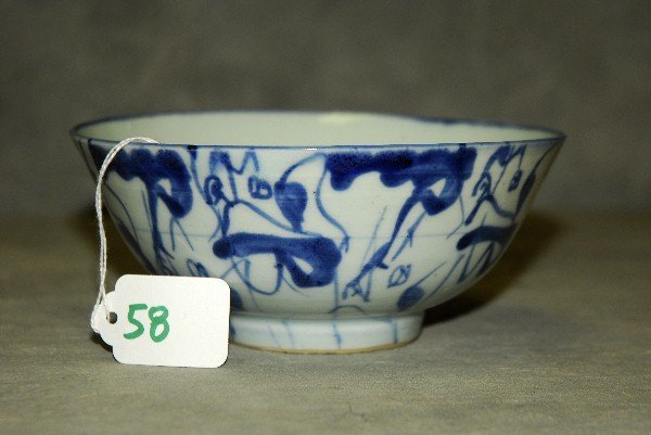 46. Antique Chinese blue and white porcelain bowl with: 46. Antique Chinese blue and white porcelain bowl with 4 character marks on bottom. H:2.75" D:6.5"