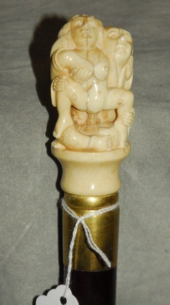 128. Carved bone handle cane 36": 128. Carved bone handle cane 36"