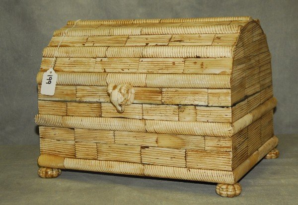199. Carved bone storage box with rams head handle. H:: 199. Carved bone storage box with rams head handle. H: 10" W: 13.25" D: 10"
