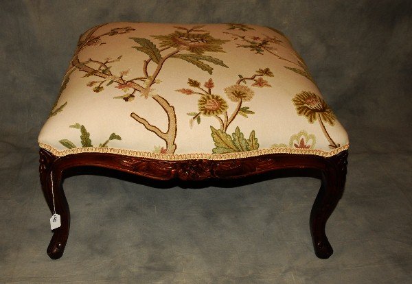 Louis XV style carved mahogany and crewl work upholsted: Louis XV style carved mahogany and crewl work upholsted ottoman. H: 16" W: 29.25" D:29.25