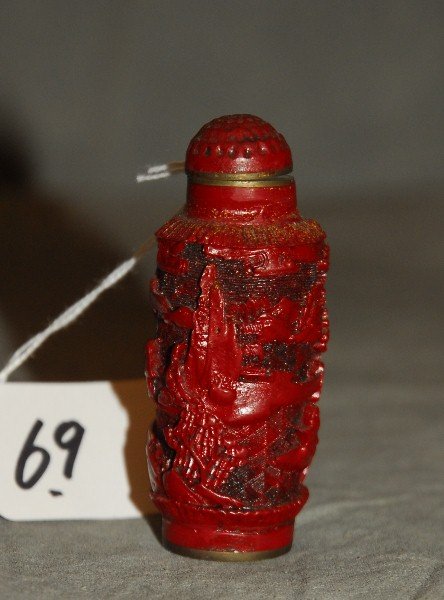Chinese cinnabar snuff bottle with four character mark (1 of 2)