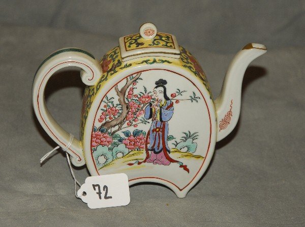 Chinese famille jaune porcelain teapot with six: Chinese famille jaune porcelain teapot with six character mark on bottom. H: 6.5" W: 8"