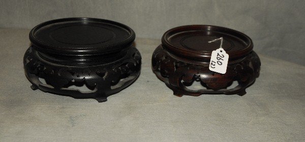 2 Antique Chinese carved hardwood stands. Largest H: 4": 2 Antique Chinese carved hardwood stands. Largest H: 4" D: 8"