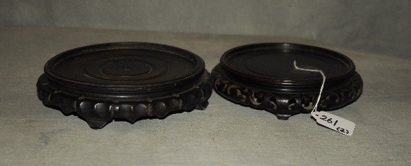2 Antique Chinese carved harwood stands. Largest H: 2": 2 Antique Chinese carved harwood stands. Largest H: 2" D: 7"