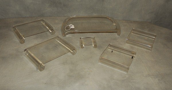 6 Lucite stands. Largest H: 2.5" W: 15.5" D: 8": 6 Lucite stands. Largest H: 2.5" W: 15.5" D: 8"