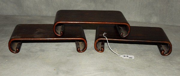 3 Chinese hardwood scroll stands. H: 2" W: 10" D: 6" (1 of 1)
